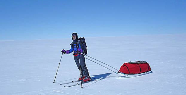 man pulling sledge