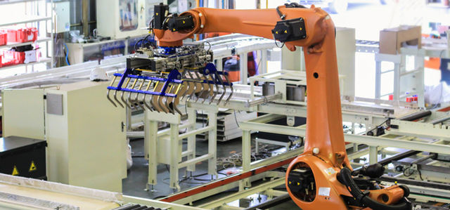 Industrial picking robot in production line manufacturer factory