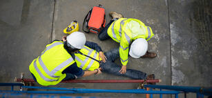 Basic first aid training for support accident in site work, Builder accident fall scaffolding to the floor, Safety team help employee accident.