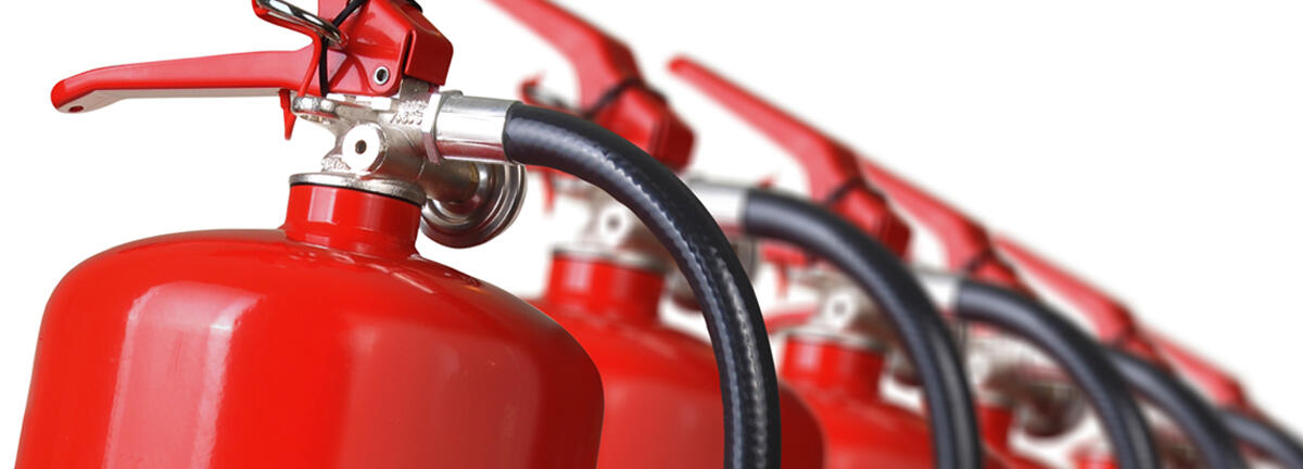 fire extinguishers close up isolated on white background